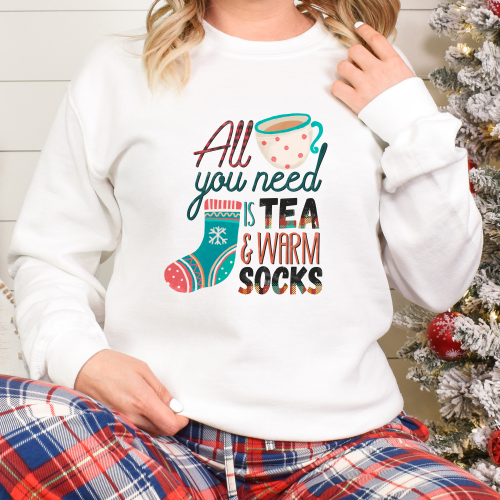 Cozy up this Christmas with Tea and Warm Socks Ugly Sweater